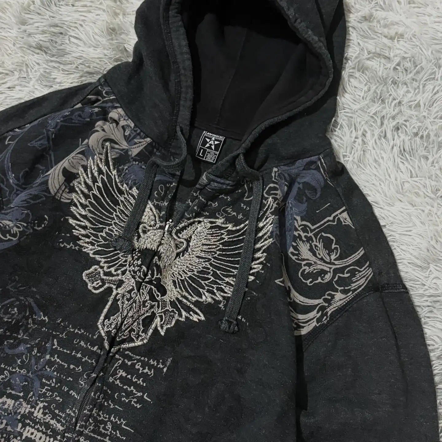 WINGED ZIP-UP®